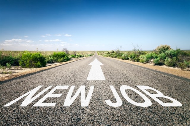 An image of a road to the horizon with text new job